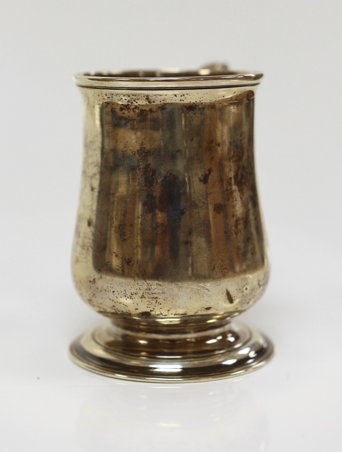 A George II silver baluster mug, London, 1733, 10cm, 192 grams.